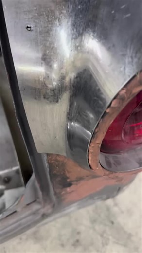 Working on the new handmade quarter panel on the 51 ford