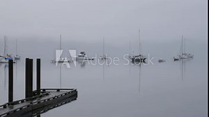 Boats at the Cowichan Bay Wharf on Vancouver Island in Cowichan Bay, British Columbia, Canada