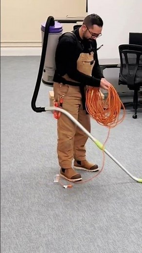 This is the proper way to roll up a vacuum cord — the way professional cleaners are trained to do it