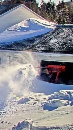 Kubota snow blowing big snow drift