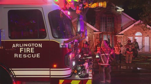 Fire crews battle large blaze in Arlington, authorities say