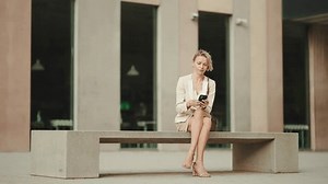 Businesswoman Blond Hair Using Cellphone Outside Stock Footage Video (100% Royalty-free) 1104964395 | Shutterstock