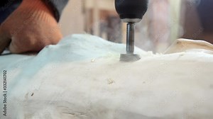 Сarpenter works with wood. Wood sculpture start. Use of Forstner bit in woodworking