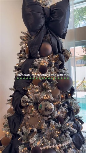 Decorate my christmas tree with me🎄 #christmas #christmastree #bowtopper #diybow #christmasdecor #neutralchristmas | Donnae Giron
