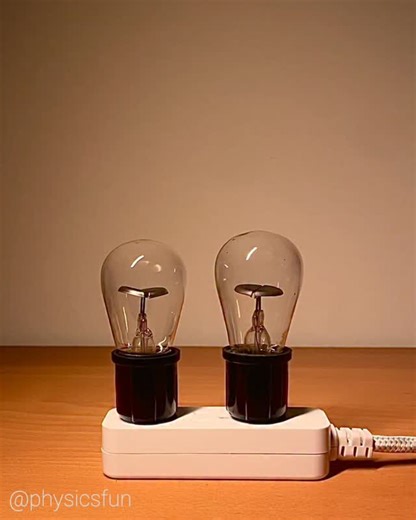 Vintage Bulb Spectra: emission line spectra identify the gas within these two vintage discharge glow bulbs- revealed here by a 500 line/mm diffraction grating. The color of each gas is due to a mix of the colors emitted from electron energy transitions specific to each element, the basis of spectroscopy. ➡️ Follow the link in my profile for info on where to get a diffraction grating slide and many other amazing items featured here on @physicsfun #physics #physicstoy #physicsfun #neon #argon #emi