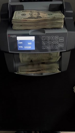 Counting Money with a High-Speed Money Counter