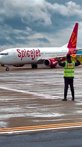 18K views · 250 reactions | Guiding us home safely, one flight at a time. ✈️ Our marshals are the unsung heroes behind every smooth landing. Credit - @i__m__srk__55 #flyspicejet #spicejet #takeoff #flights #aviation #flyhigh #planespotting #planeview #travelwithus #travel #addspicetoyourtravel | FlySpiceJet | Facebook
