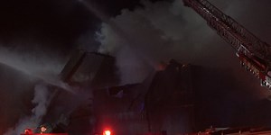 Mayville grain elevator fire now contained, road closures to continue