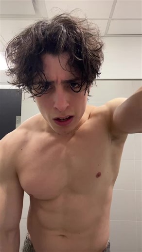 Showcasing a Muscular Physique in a Modern Setting