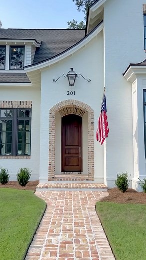 Wildflower Lane Cottage embodies French Country style with a modern twist. Its curved roofline, arched entryway, and spacious, light-filled interior shows its appreciation for timeless detailing and contemporary design. Designed by Bob Chatham Custom Home Design Built by Frostholm Construction LLC #homedesign #customhomes #customhome #bobchathamcustomhomes #customcottage #bobchathamcustomhomes #customcottage #cottagestylehome #cottageinspired #cottageinspiration #cottageexterior #exteriorarchite