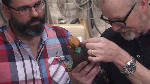 Adam Savage was super excited about his visit from Jimmy and Gary of Aardman Animations. But he had NO idea just how memorable that visit was about to become! (Spoiler alert: They made him his own mini-me!) Watch the FULL video here: http://bit.ly/2cKGODr | Tested