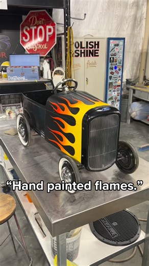 Diego Cerone on Instagram: "Masking. Layers. Patience. Hand painted flames. Pinstriping next. #custompaint #hotrodstyle #handpainted #oldschool"