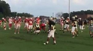 McKenzie Rebel Eric Robinson in for the TD against Dresden during Friday evening scrimmage. | The Banner: Tri-County News from Carroll, Henry & Weakley