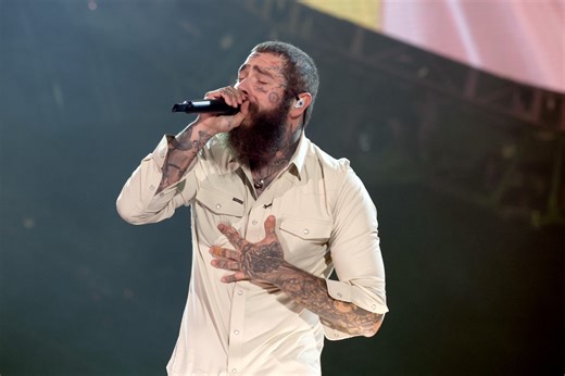 Post Malone Falls Off Stage While Interacting With Fan