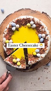 This gorgeous Easter Cheesecake features a stunning rainbow swirl and is finished with festive Cadbury mini eggs. And it's actually EASY to make with ONE cheesecake batter and a pre-made sugar cookie crust! 🙌 #eastercheesecake #cheesecakerecipe #EasterDesserts #cadburyeggs | The Soccer Mom Blog - Positive Inspiration for Moms