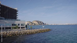 Postiguet beach breakwater with coast views in Alicante, Costa Blanca, Spain, Mediterranean