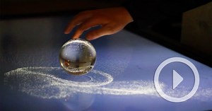 Kinetic Sand: A Magical Interactive Glass Sphere Installation
