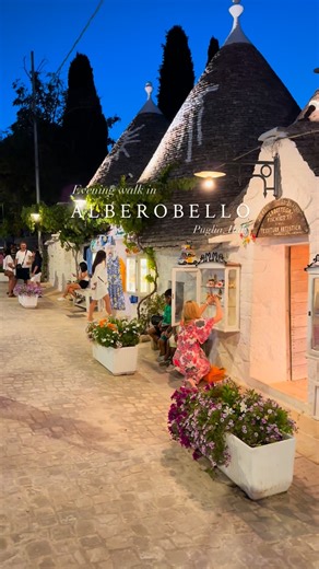 A night walk in Alberobello feels like stepping into a dream. The whitewashed trulli houses glow softly under the moonlight, creating an enchanting atmosphere in the heart of Puglia, Italy. 🌙🏠 As you wander through the narrow stone streets, every corner reveals the charm of this UNESCO World Heritage village. The quiet, the lights, and the scent of summer make it a truly magical experience. ✨🌿 There’s something timeless about Alberobello at night — a perfect blend of history, beauty, and sere