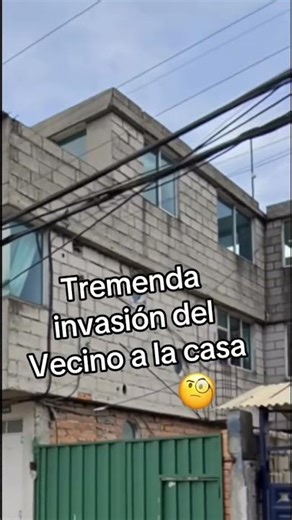 The house has windows that face the neighbor's property. #house