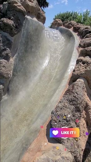 Grotto with Slide #pool #waterfall #waterfeature #diy #custompools #spa #concrete #beautifulpools