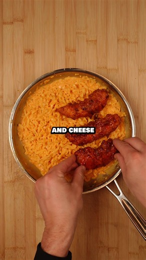 Hot Honey Chicken Tenders & Cheesy Ramen Extra crispy, double-fried chicken tenders tossed in a buttery hot honey buffalo sauce, served over ridiculously creamy, cheesy ramen! Chicken Marinade 2 lb chicken tenderloins 1 cup buttermilk ⅓ cup pickle juice 1 tbsp hot sauce 1 tbsp Cajun seasoning ½ tbsp each garlic powder, onion powder, cayenne & black pepper 1 tsp each garlic & herb seasoning and dried parsley Crispy Dredge 4 cups flour 2 tbsp Cajun seasoning 1 tbsp each garlic powder, onion powder