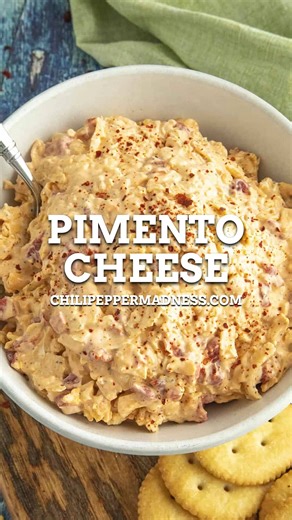 This homemade pimento cheese recipe captures the rich, classic flavors of the South, combining shredded cheeses, mayonnaise, pimentos, and seasonings for a creamy and flavorful spread or dip. Follow this easy recipe to make it from scratch! 😎 RECIPE: https://www.chilipeppermadness.com/recipes/pimento-cheese/ If the link does not work on your mobile, please google “pimento cheese chili pepper madness”. Use hashtag #chilipeppermadness if you make this recipe! | Chili Pepper Madness - Recipes & Mo