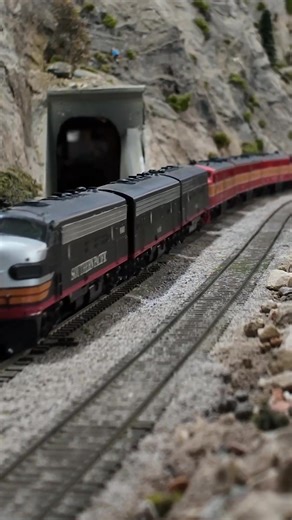 The Overland tackles the grade up the Sierra Nevada mountains with the help of a brace of F units. #modeltrains #trains #modelrailroad #modelrailroading #scalemodel #hoscale #hoscaletrains #museum #bayarea | Golden State Model Railroad Museum