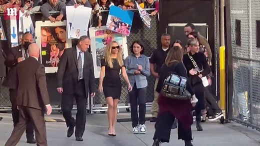 Reese Witherspoon in leggy display arriving for Jimmy Kimmel