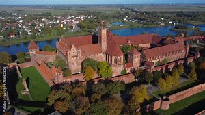 Aerial 4K drone video of beautiful red-brick Malbork Castle, Poland - near Gdansk