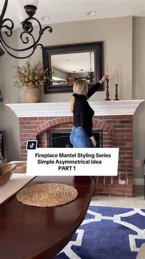 Fireplace mantel styling series ✨ | Part 1 A simple asymmetrical mantel using a vase with florals or greenery on one side, balanced with a grouping of candlesticks on the other. To add warmth, I styled the hearth with a basket and a throw pillow (or seasonal pieces for an easy swap). Save this for your next mantel refresh 🤍 #homedecortips #fireplacemantel #mantelstyling #homestyling #manteldecor