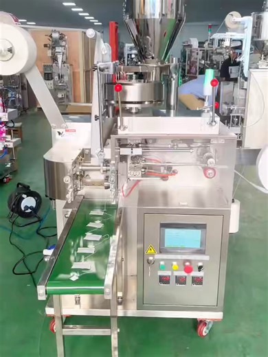 #Inner tea bag packaging machine #Tea filter paper hanging thread and label #Automatic packaging machine #teabag packing machine #packing machine for green tea #packing machine for tea 2-4g