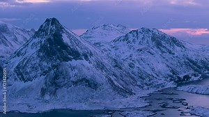 norway lofoten islands aerial shot winter season snowy landscapes sunset colors