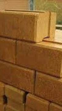 Making Interlocking bricks using murram and cement