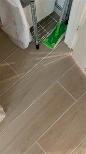 Hollow sounding tiles, is this acceptable? New tile installed a little over a week ago…