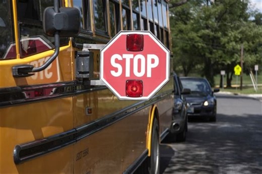 Here's your yearly reminder that BC drivers must stop for a school bus with lights flashing