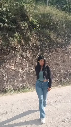 Casual Outdoor Look: Teal Tank Top and Black Jacket