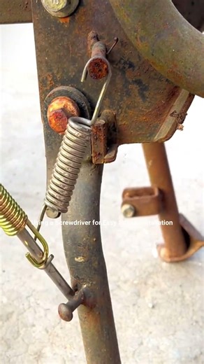 Using a Screwdriver for Easy Spring Installation