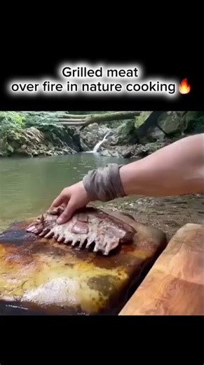 Grilled meat over fire in nature cooking 🔥🥩 #asmr #cooking #bbqmeat #outdoorcooking #meat #nature