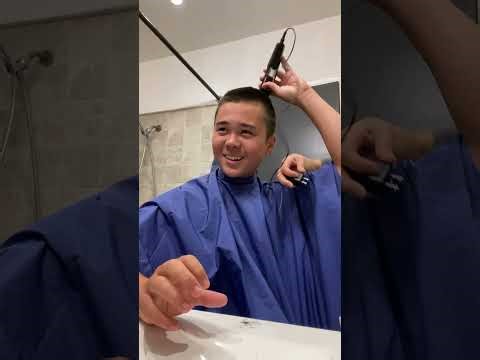 His very first buzz cut