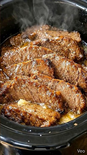 Slow Cooker Beef Brisket. #easyrecipes #recipe #easyrecipe #cheesypotatoes #cooking #food