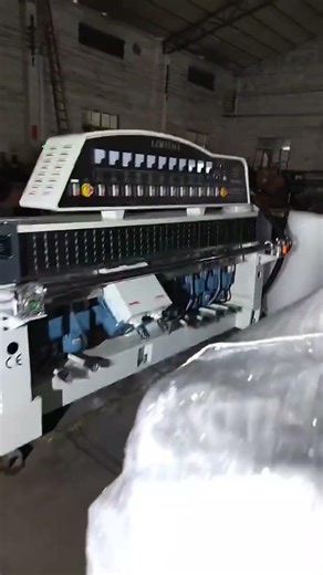 What are the advantages of using a PLC Glass Edging Machine?