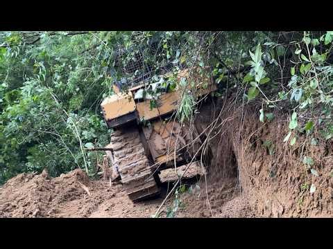 The Process of Cutting a Hill With a D6R XL Bulldozer in an Extreme Landslide Zone
