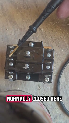 hvac technician shows how a double pole double throw relays works