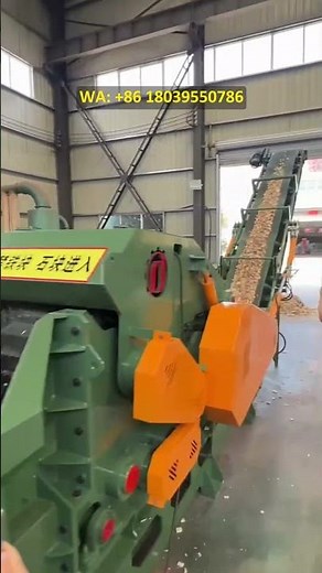 Drum chipper, wood chipper, real-life demonstration of biomass wood chip production.