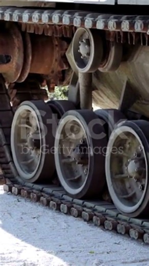 Armoured army tank driving on mud