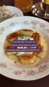 Every year we invite local New Orleans foodies, chefs, and influencers to pick their favorite dishes in the city that you can’t miss in the new year! On our last lap, we’re passing the phone to culinary experts @eatingwithcaitt dining at @saintclaire_neworleans , @eatenpathnola dining at @the_queen_trini , and @hownola dining at @jacques_imos_cafe Comment “2026 DISHES” for the full list! | Visit New Orleans