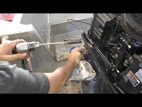 Cleaning an outboard tilt tube