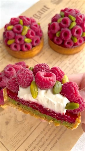 Misabaking on Instagram: "Raspberry Pistachio Frangıpane Tart 🍰Tarifin Türkçesine yorum kısmından bakabilirsiniz ✨ Ingredients: For the crust 200 g butter 80 g granulated sugar 330 g flour 1 egg A pınch of salt For the top of the crust dough: 20 g egg yolk 20 g cream Dırectıons: Mix flour, sugar and salt in the food processor. Add the butter you cut into cubes piece by piece.Add egg and stir until well combined and a uniform dough is formed. Press dough between two baking paper. Put to the drid