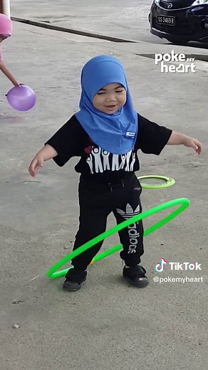 Hula hoop newbie, but a pro at having fun!#cute#kids#hulahoops