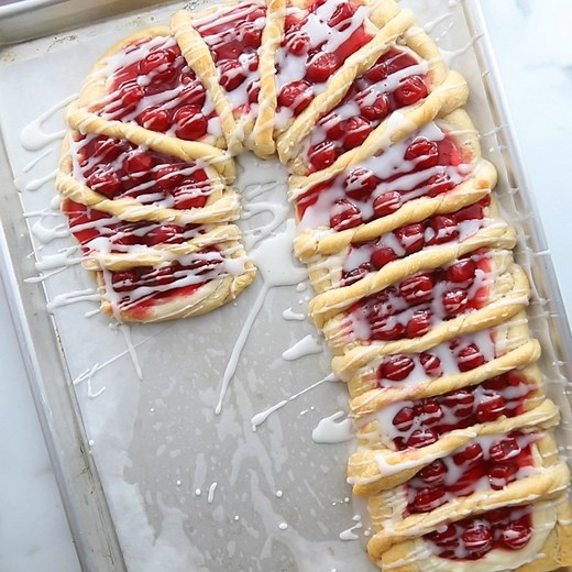 This candy cane cherry & cream cheese danish is the perfect sweet dessert for your holiday season! Get the fully recipe here>> https://www.madetobeamomma.com/candy-cane-cherry-cream-cheese-danish/ | Made to be a Momma